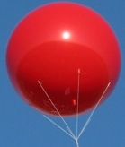 advertising balloon - red color helium advertising balloon shown in sky