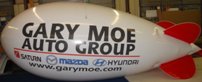  blimps - 17ft. blimp without lettering from $951.00 17ft. helium blimp with logo or lettering from $1320.00. Custom colors available!