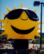Sun shape cold-air advertising inflatables for sale or rent.